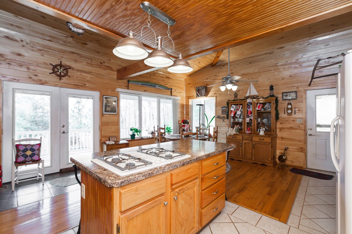 3155 Rocky Point Road Stewart, TN 37175 - Photo 10 of 44 a large kitchen with a table and chairs