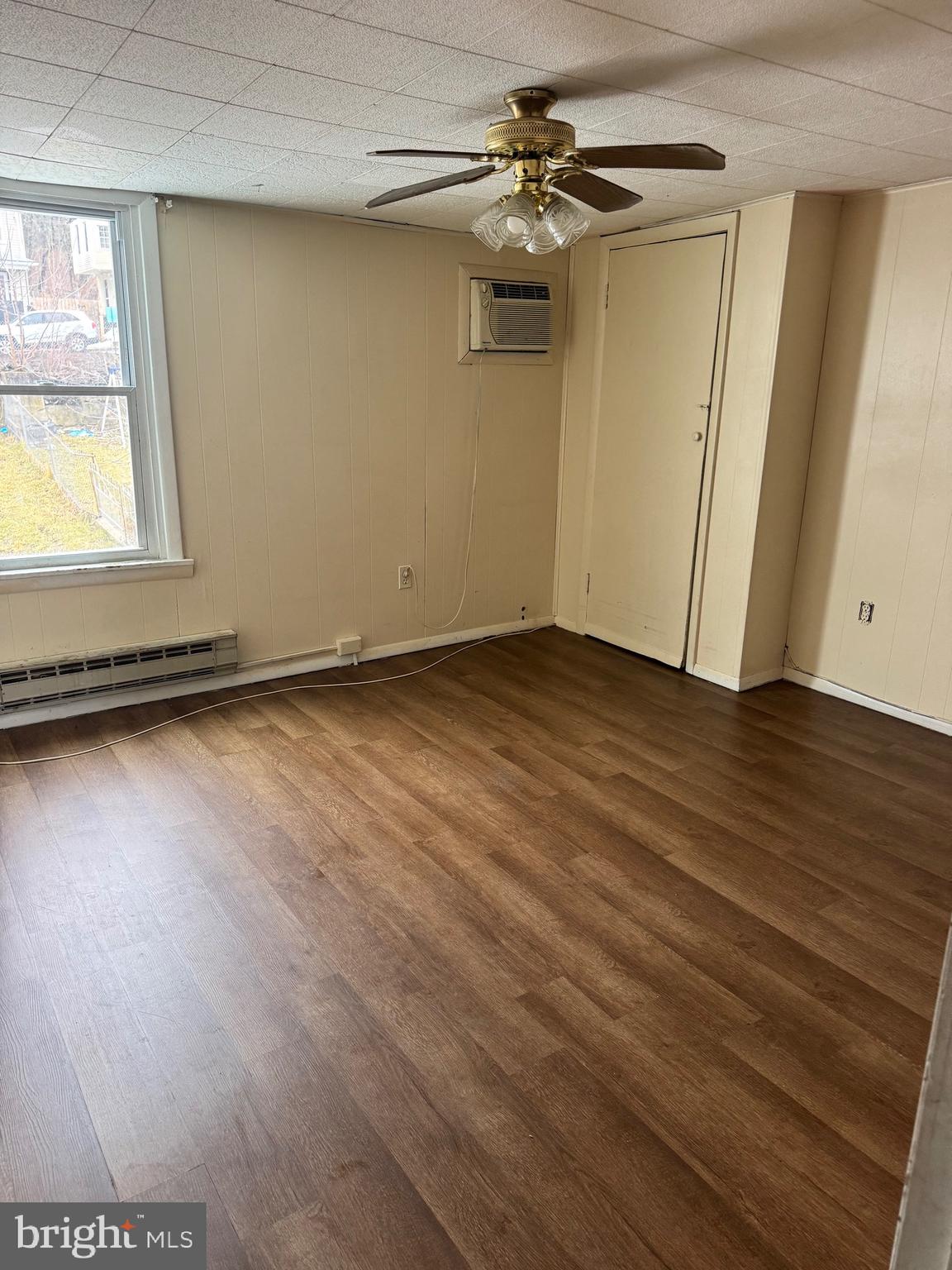 1620 Walnut Street Ashland, PA 17921 - Photo 11 of 25 a view of an empty room with window and wooden floor