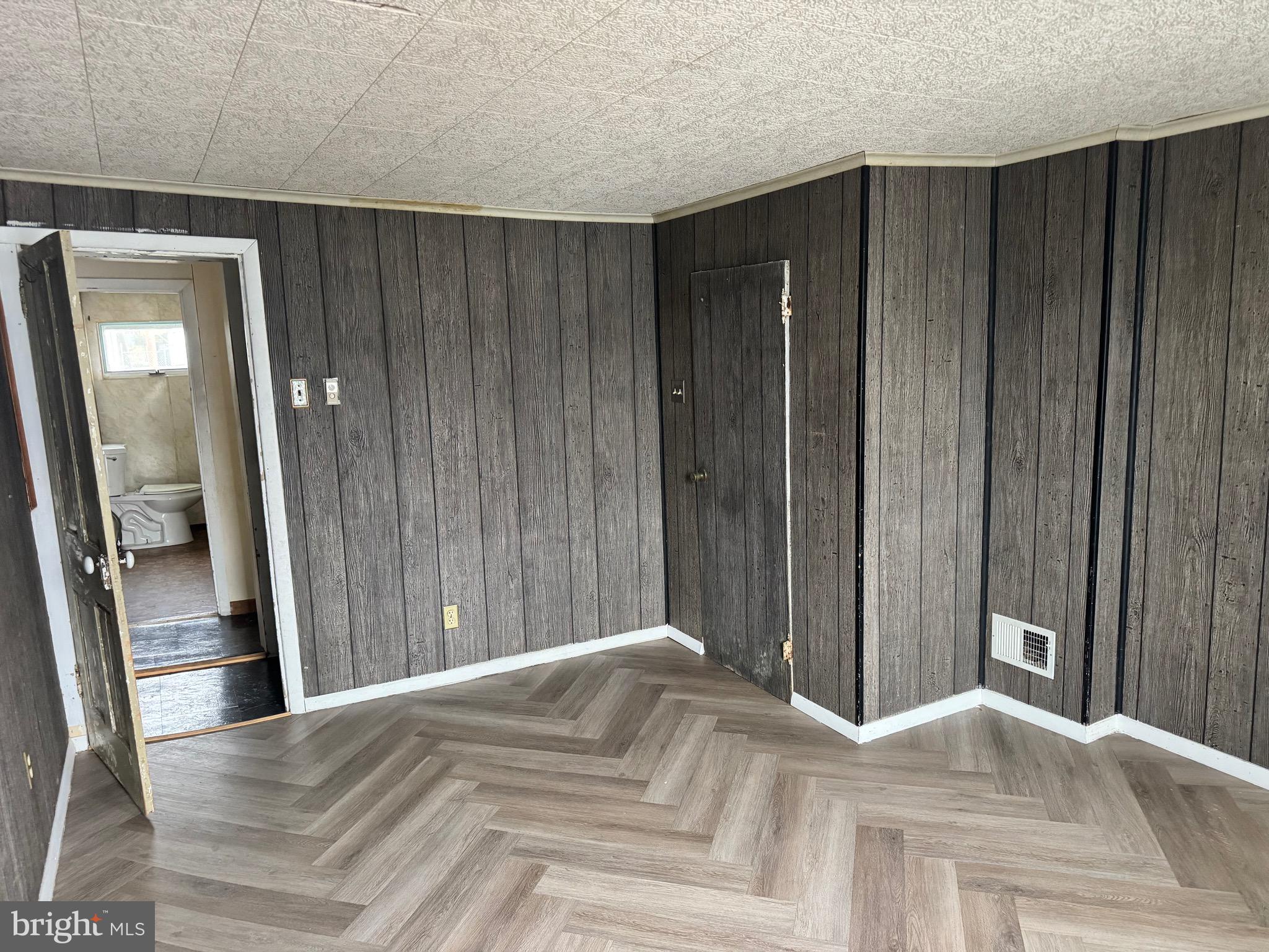 1620 Walnut Street Ashland, PA 17921 - Photo 14 of 25 a view of a hallway with wooden floor and staircase