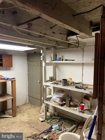 a kitchen with a stove and cabinets