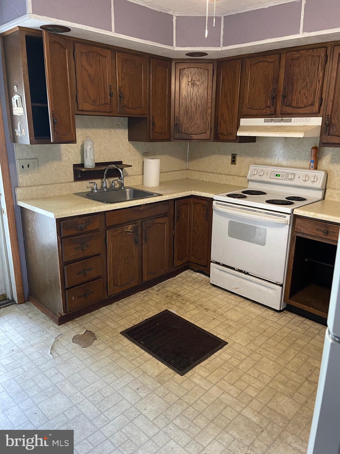 1620 Walnut Street Ashland, PA 17921 - Photo 2 of 25 a kitchen with a cabinets and white appliances