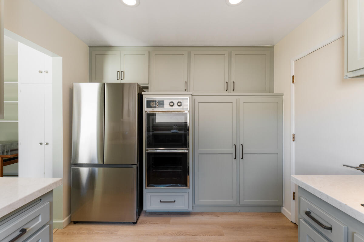 4126 Foothill Road Santa Barbara, CA 93110 - Photo 13 of 32 a metallic refrigerator freezer sitting in a kitchen