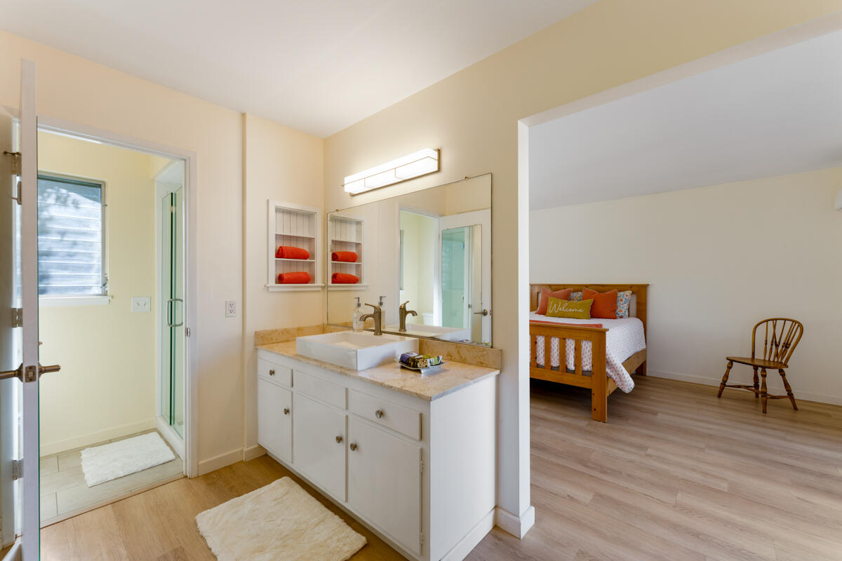 4126 Foothill Road Santa Barbara, CA 93110 - Photo 15 of 32 a hall view with wooden floor and furniture