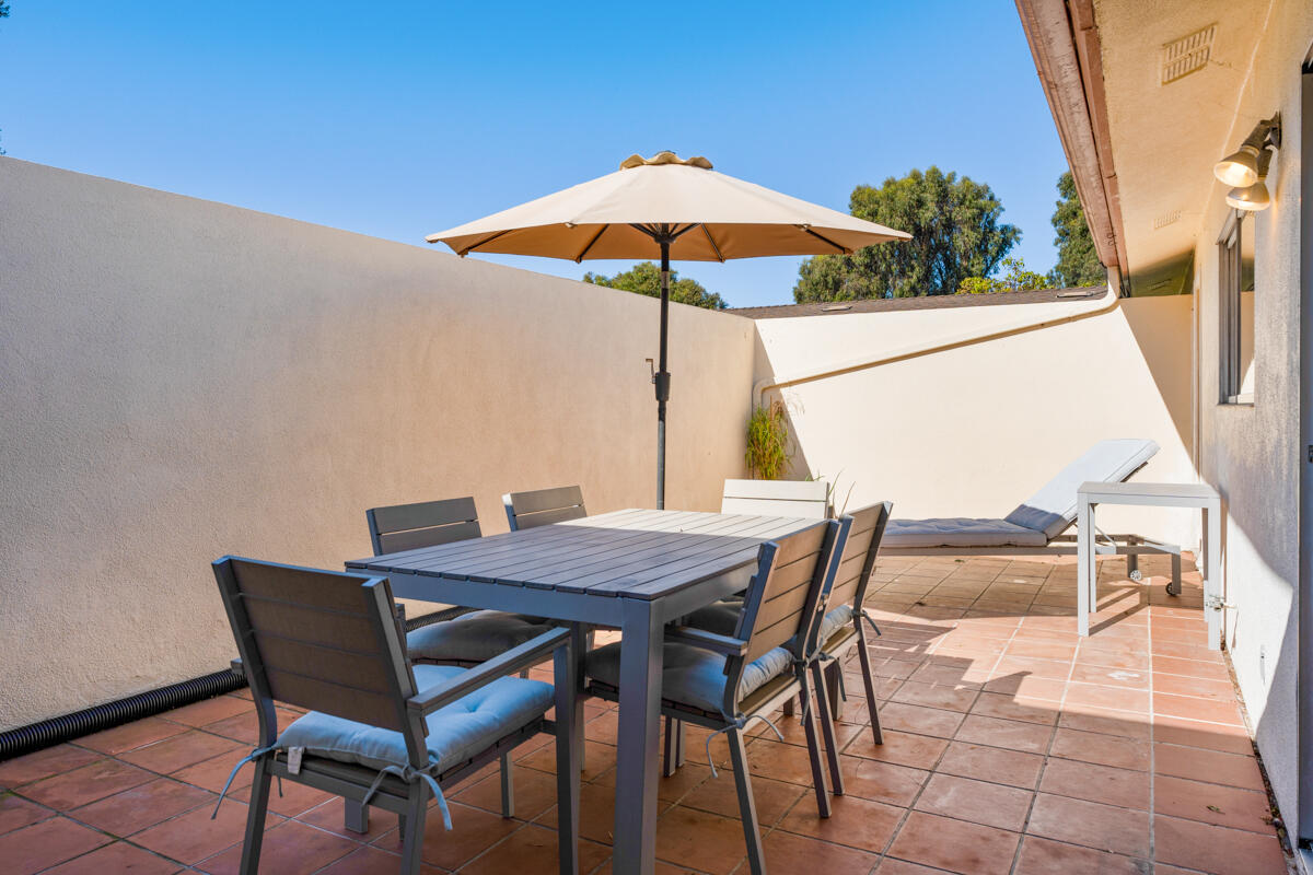 4126 Foothill Road Santa Barbara, CA 93110 - Photo 20 of 32 a view of an outdoor space with furniture and umbrella