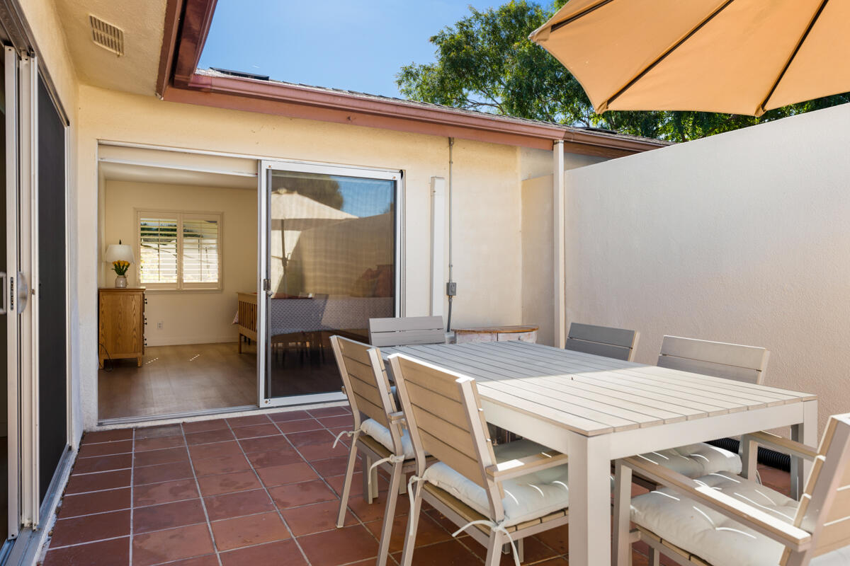 4126 Foothill Road Santa Barbara, CA 93110 - Photo 21 of 32 a view of a patio with table and chairs