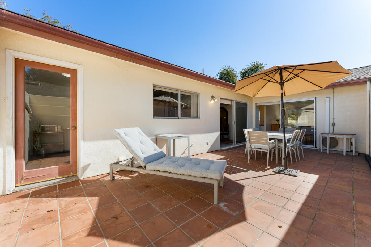 4126 Foothill Road Santa Barbara, CA 93110 - Photo 22 of 32 a patio with a table and chairs