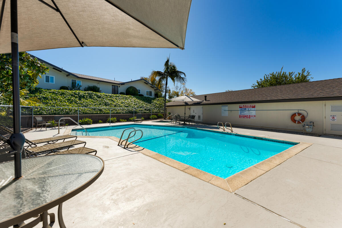 4126 Foothill Road Santa Barbara, CA 93110 - Photo 26 of 32 a view of a swimming pool with a yard and plants