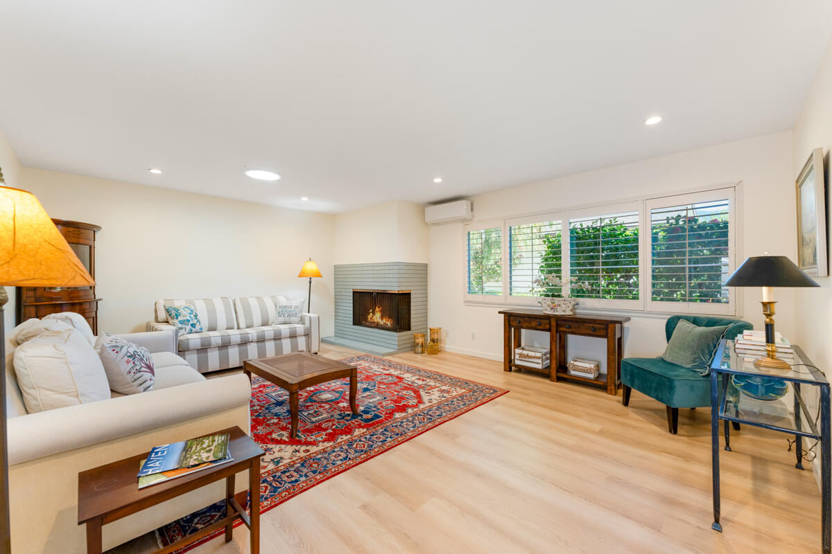 4126 Foothill Road Santa Barbara, CA 93110 - Photo 4 of 32 a living room with furniture fireplace and a large window