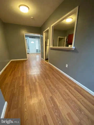 a kitchen with stainless steel appliances granite countertop a sink and a stove top oven