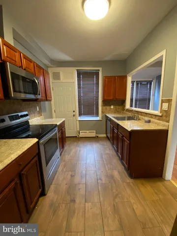 a view of a house with wooden floor