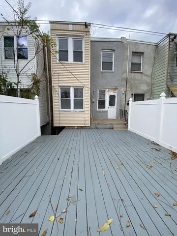 a bathroom with a shower and a toilet