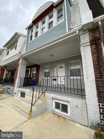 a view of a building with a bench