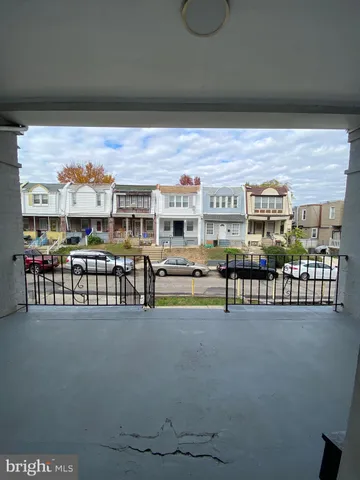a view of living room with furniture and a flat screen tv