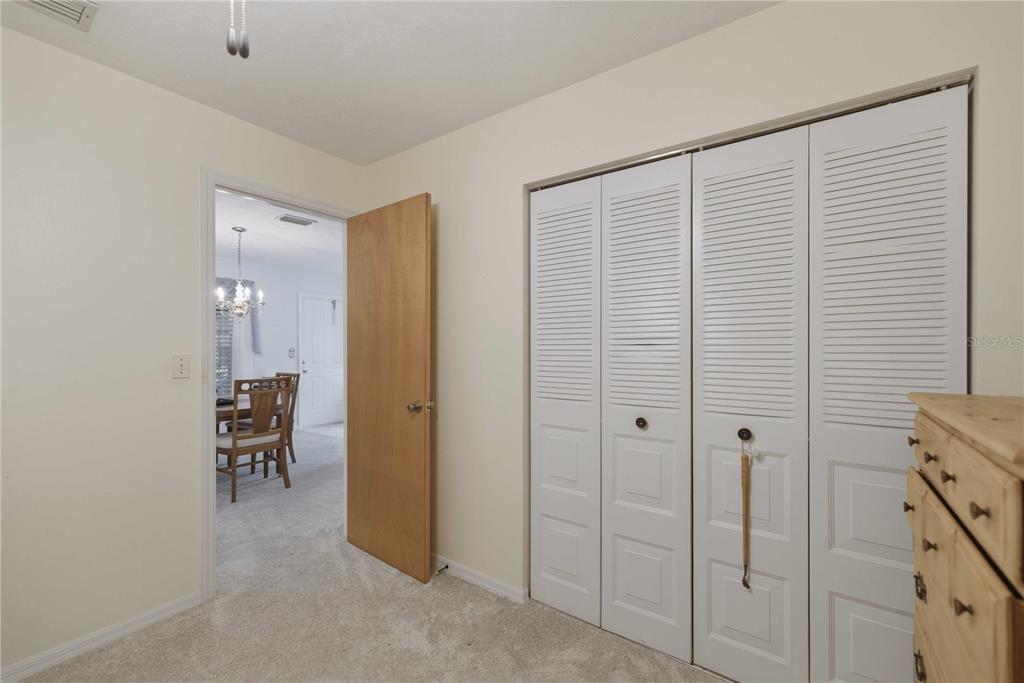 3654 Southeast 68th Street Ocala, FL 34480 - Photo 14 of 25 a view of a hallway with dining area