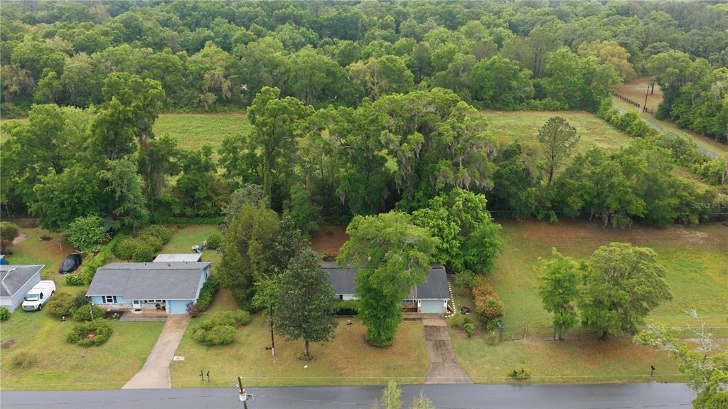 3654 Southeast 68th Street Ocala, FL 34480 - Photo 24 of 25 an aerial view of residential house with outdoor space and trees around