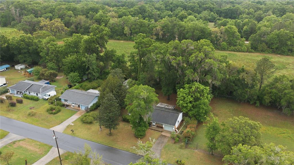 3654 Southeast 68th Street Ocala, FL 34480 - Photo 25 of 25 an aerial view of residential house with outdoor space and trees all around