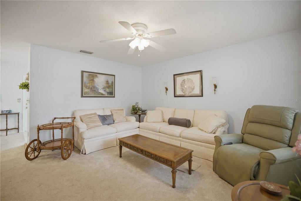 3654 Southeast 68th Street Ocala, FL 34480 - Photo 4 of 25 a living room with furniture