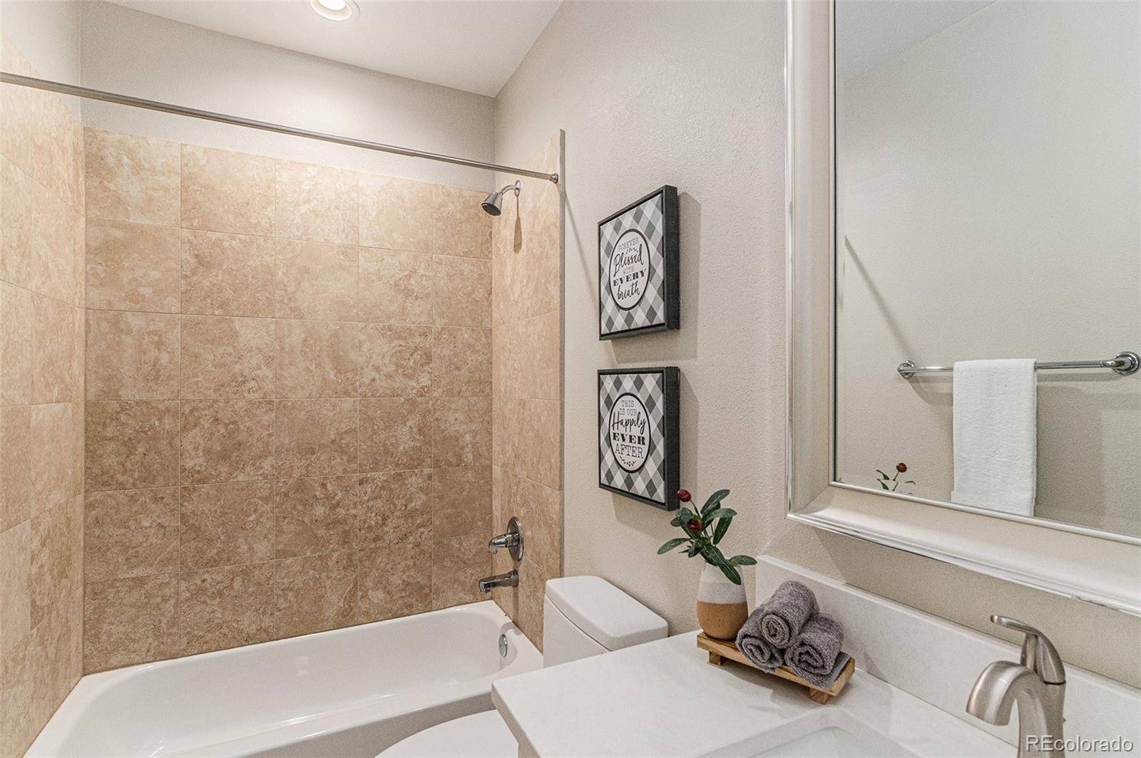 2580 17th Street, Unit 202 Denver, CO 80211 - Photo 14 of 32 a bathroom with a sink and a bathtub
