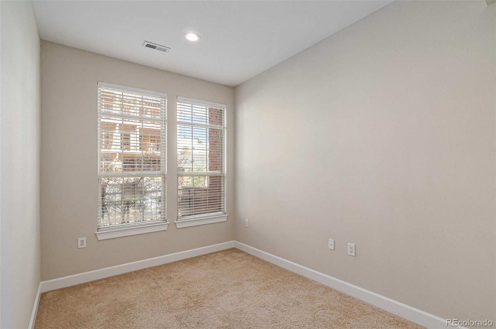 2580 17th Street, Unit 202 Denver, CO 80211 - Photo 22 of 32 a view of an empty room with a window