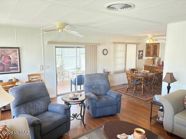 5731 West Flying M Street Tucson, AZ 85713 - Photo 9 of 20 a living room with furniture wooden floor and a large window
