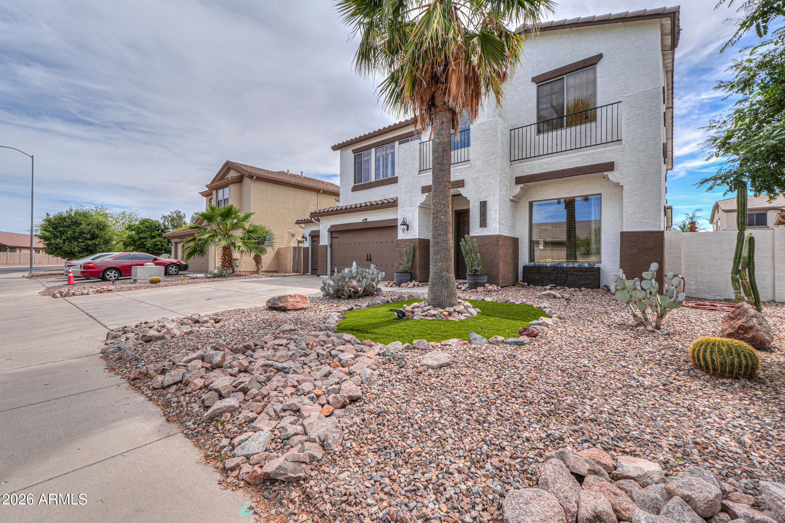 45247 West Jack Rabbit Trail Maricopa, AZ 85139 - Photo 3 of 75 a view of an house with swimming pool and furniture