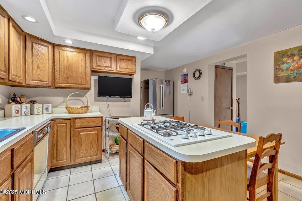 718 East Veterans Highway Jackson, NJ 08527 - Photo 14 of 32 a kitchen that has a stove and a microwave