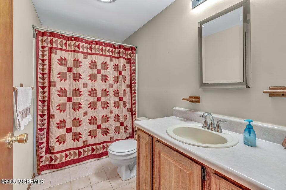 718 East Veterans Highway Jackson, NJ 08527 - Photo 27 of 32 a bathroom with a sink and a toilet