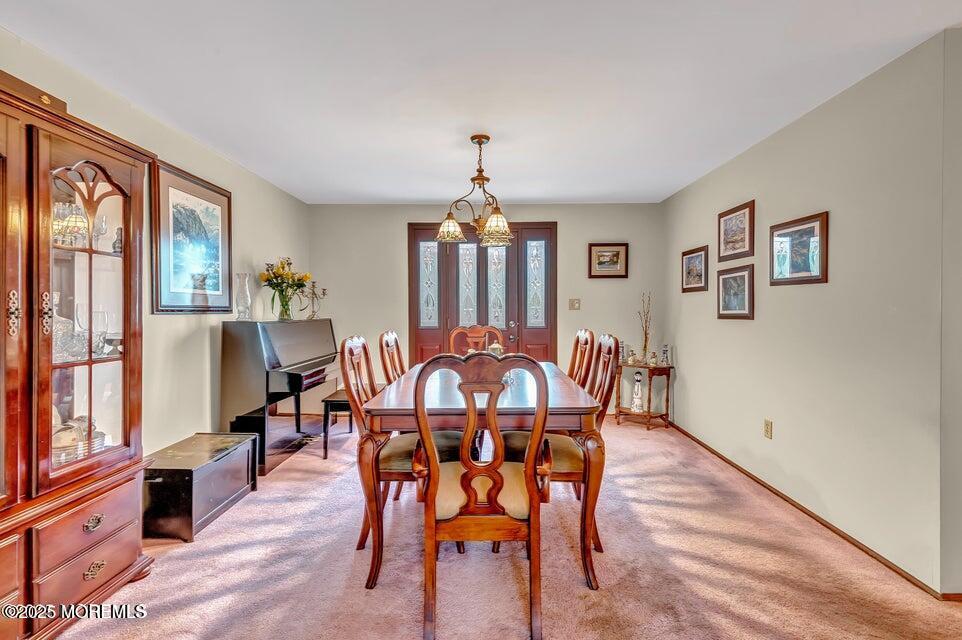 718 East Veterans Highway Jackson, NJ 08527 - Photo 8 of 32 a view of a dining room with furniture window and wooden floor