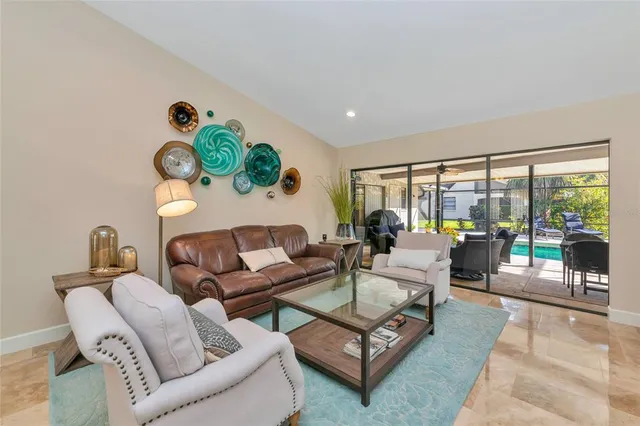 a kitchen with white cabinets stainless steel appliances and sink