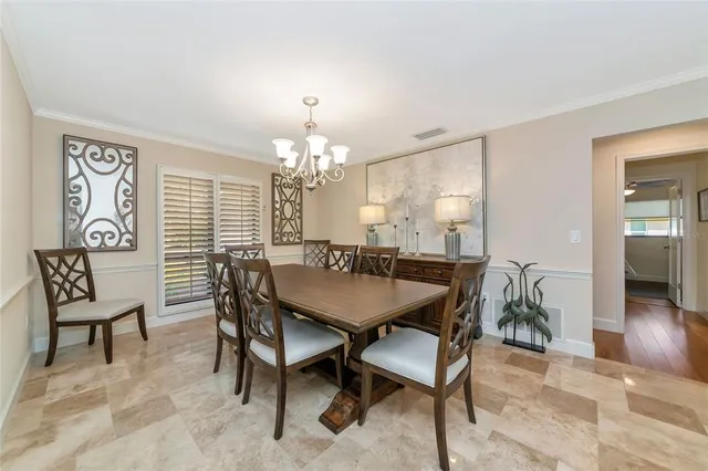 a kitchen with granite countertop a stove top oven and sink