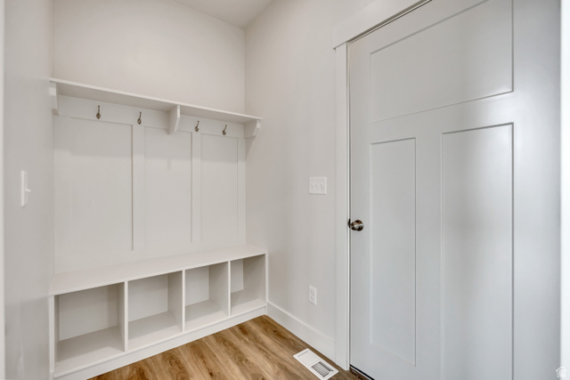 3839 West 825 North, Unit WF18 West Point, UT 84015 - Photo 19 of 22 Mudroom with light wood-style flooring and baseboards