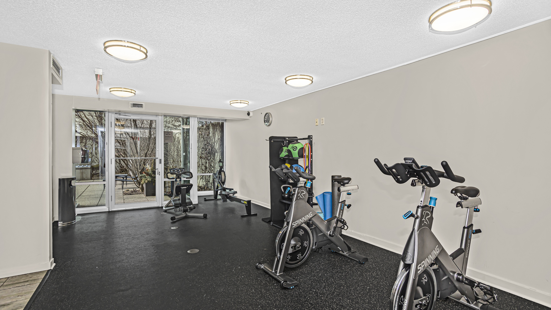 800 Elgin Road, Unit 1221 Evanston, IL 60201 - Photo 19 of 23 a view of a room with gym equipment