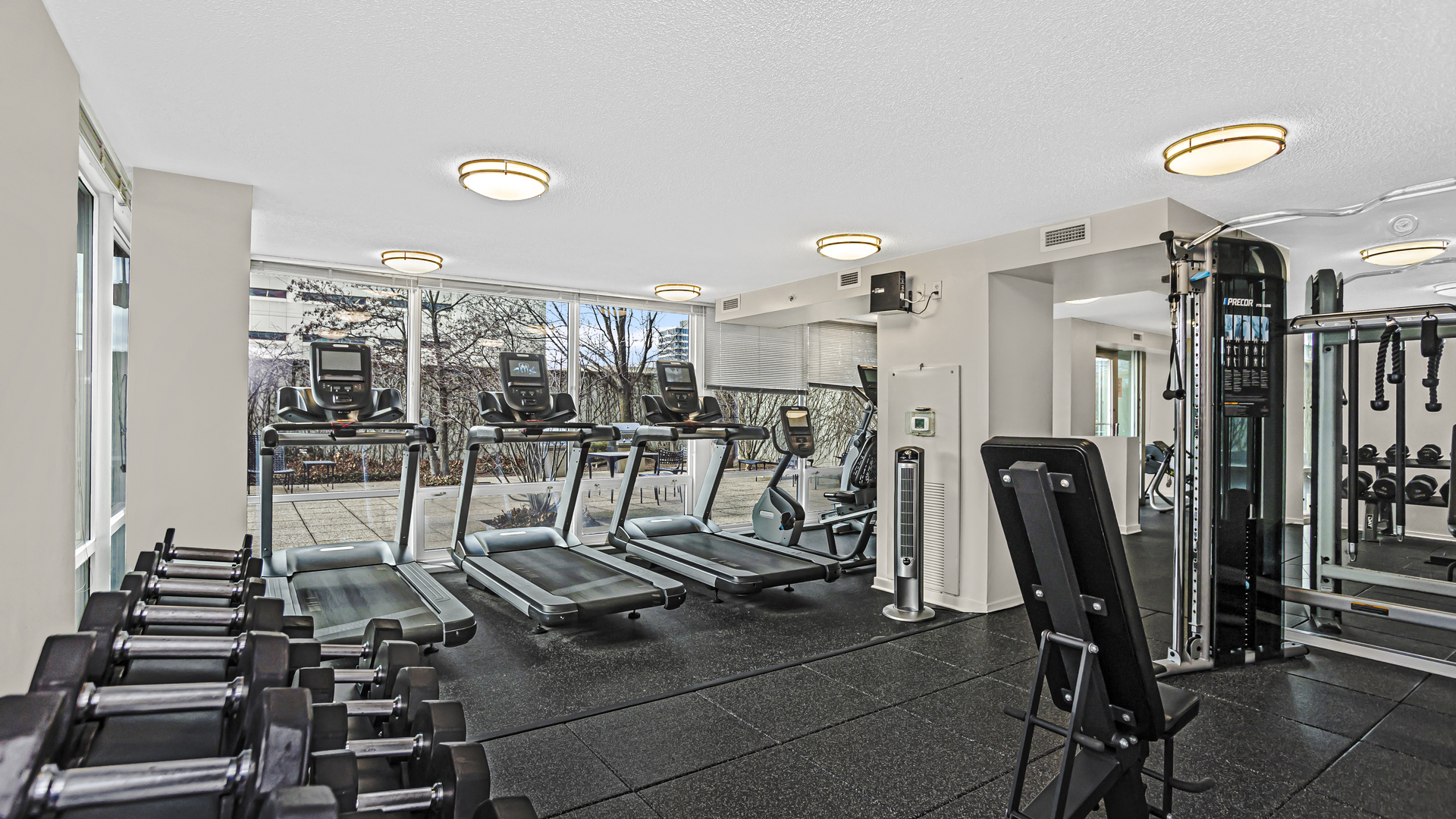 800 Elgin Road, Unit 1221 Evanston, IL 60201 - Photo 20 of 23 a view of a room with gym equipment
