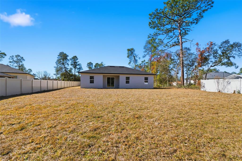 4473 Southwest 168th Lane Ocala, FL 34473 - Photo 30 of 33 a view of a outdoor space with a house