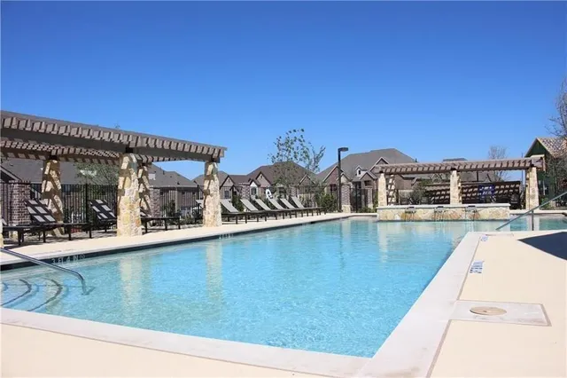a view of a house with a swimming pool