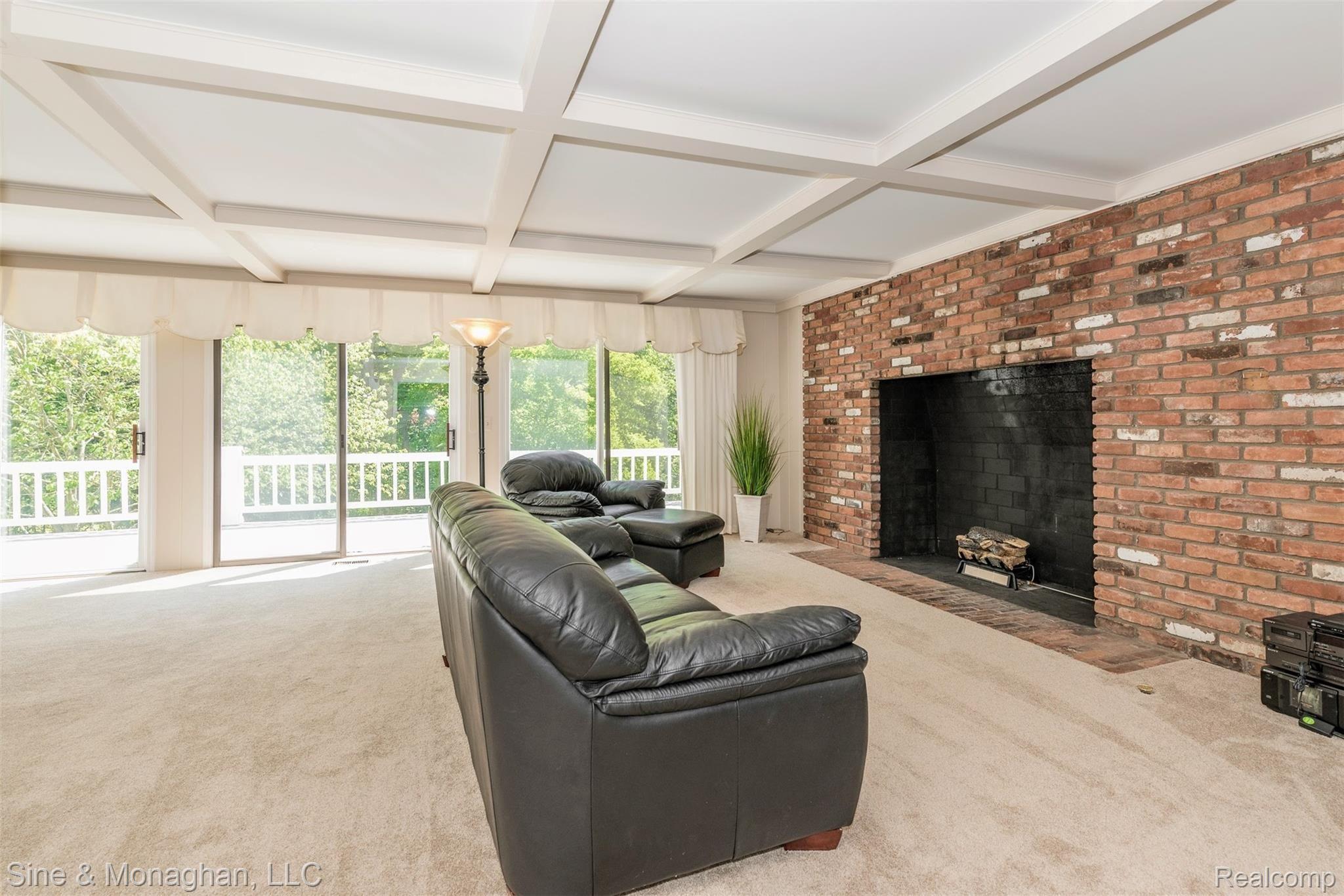 630 Overbrook Road Bloomfield Hills, MI 48302 - Photo 19 of 36 View of Family Room fireplace and coffered ceiling.