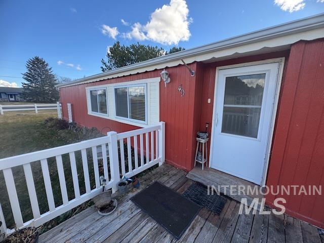 910 Moonglo, Unit 49 Buhl, ID 83316 - Photo 3 of 16 Property entrance featuring a wooden deck