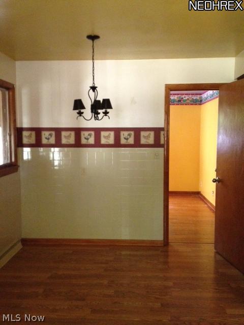 1895 Far View Road Akron, OH 44312 - Photo 9 of 24 Kitchen dining area and bedroom