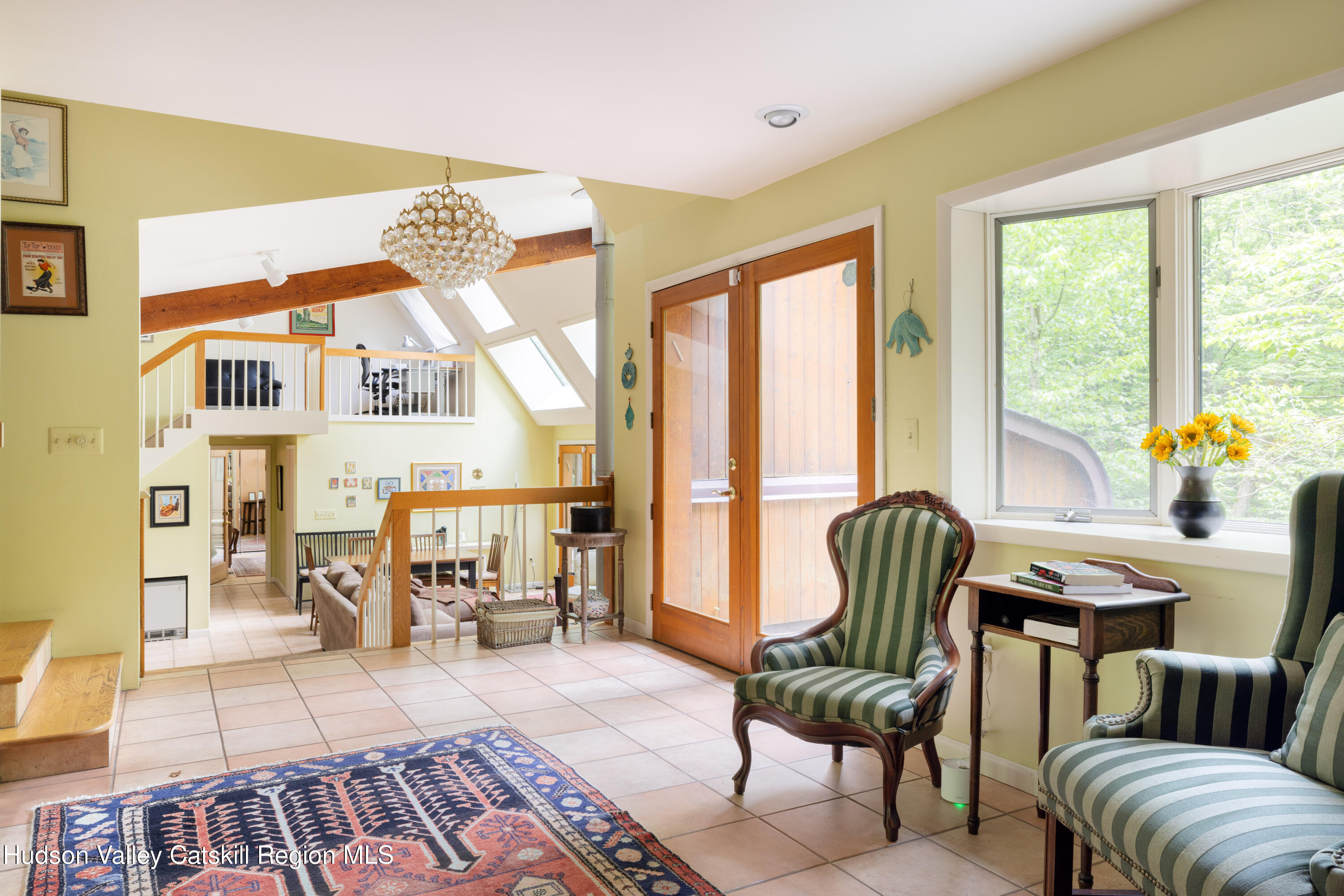 494 Edwards Road Monticello, NY 12701 - Photo 9 of 23 a living room with furniture and floor to ceiling windows