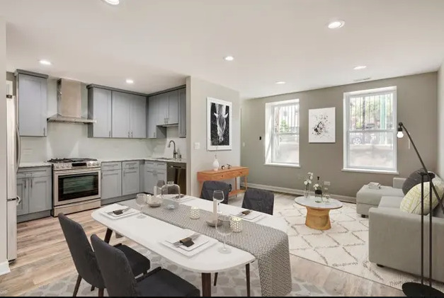 1930 South Morgan Street, Unit 1 Chicago, IL 60608 - Photo 2 of 11 a living room with stainless steel appliances kitchen island granite countertop a dining table chairs and a refrigerator