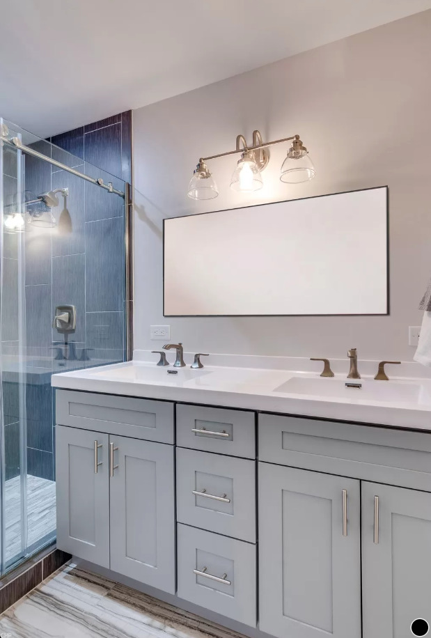 1930 South Morgan Street, Unit 1 Chicago, IL 60608 - Photo 5 of 11 a bathroom with a sink and a mirror