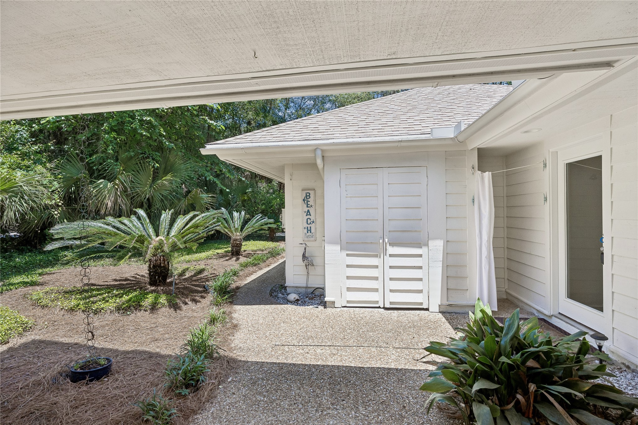 123 Bitternut Road Fernandina Beach, FL 32034 - Photo 56 of 87 Right side of home....shower off should you be returning from the beach!