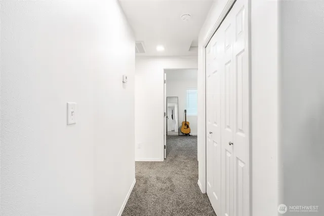 a view of a room with a bathroom
