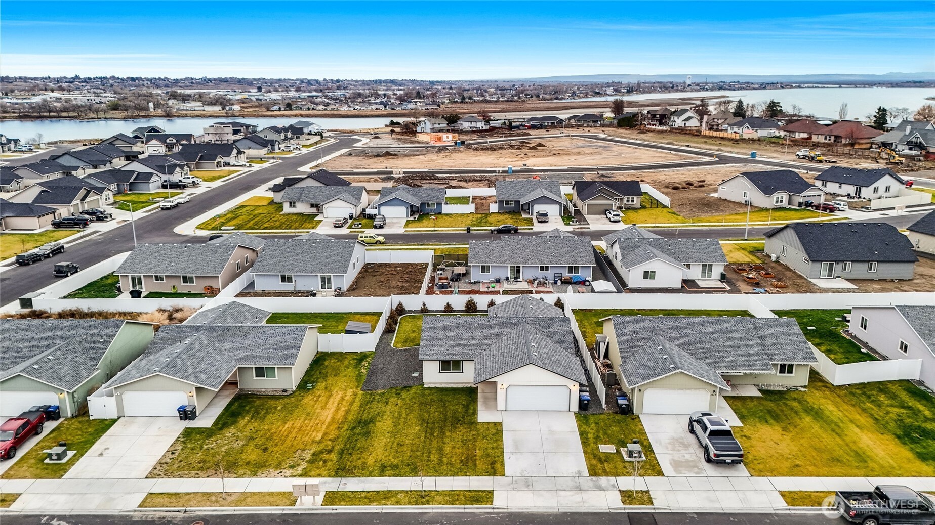 1313 Polo Ridge Moses Lake, WA 98837 - Photo 2 of 37 an aerial view of residential houses with outdoor space
