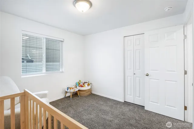 a view of a room that has a bench in it