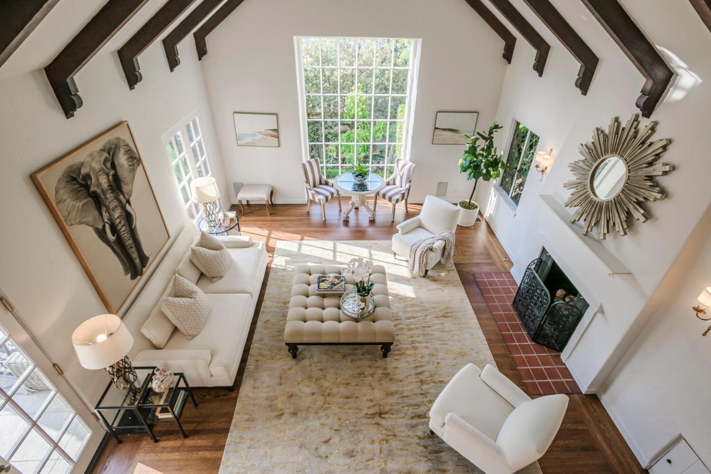 595 Hayne Road Hillsborough, CA 94010 - Photo 19 of 71 a living room with furniture rug and a large window