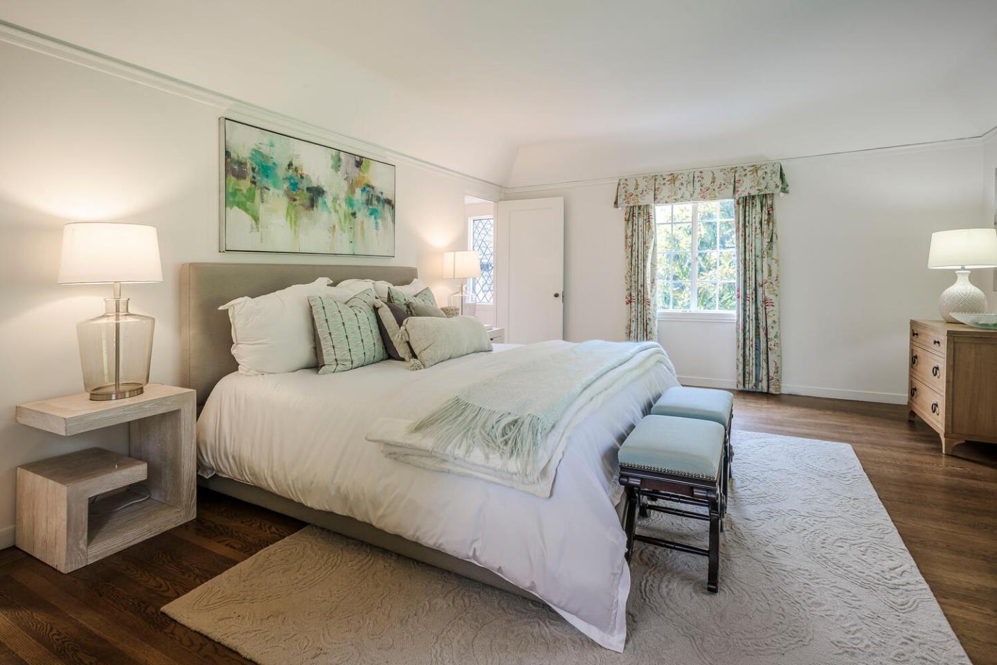 595 Hayne Road Hillsborough, CA 94010 - Photo 23 of 71 a bedroom with a bed and a couch