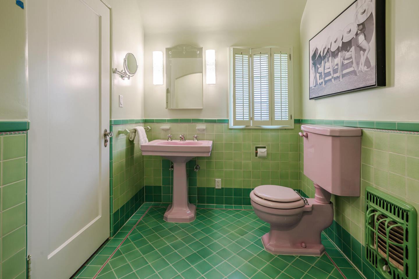 595 Hayne Road Hillsborough, CA 94010 - Photo 27 of 71 a bathroom with a sink toilet and a mirror