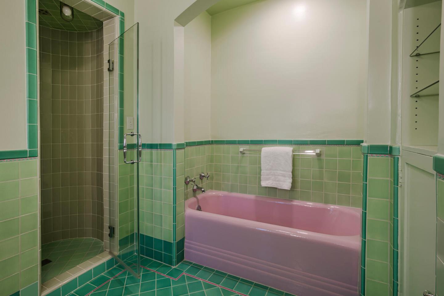 595 Hayne Road Hillsborough, CA 94010 - Photo 28 of 71 a bathroom with a bathtub and shower