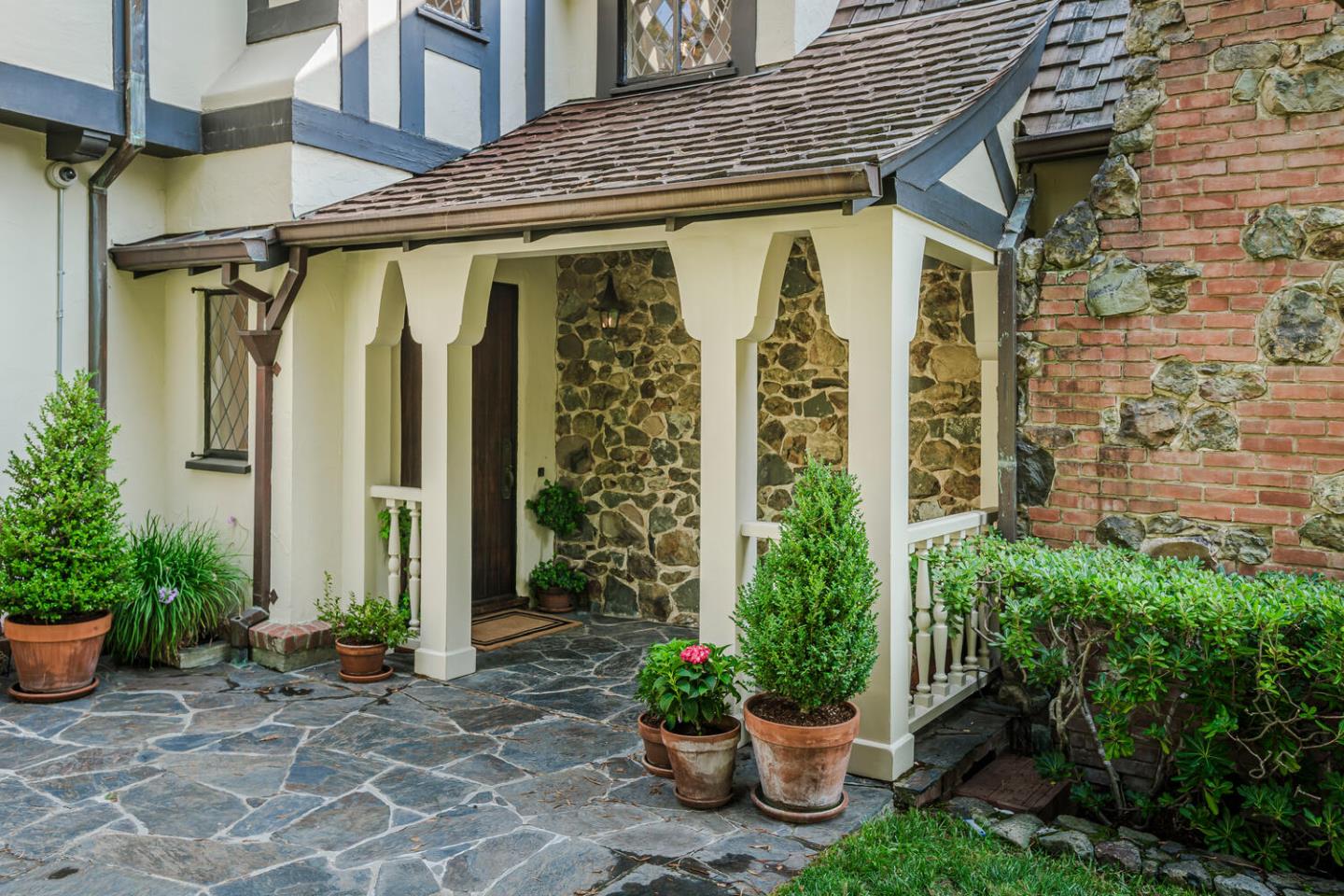 595 Hayne Road Hillsborough, CA 94010 - Photo 50 of 71 a view of a house with potted plants